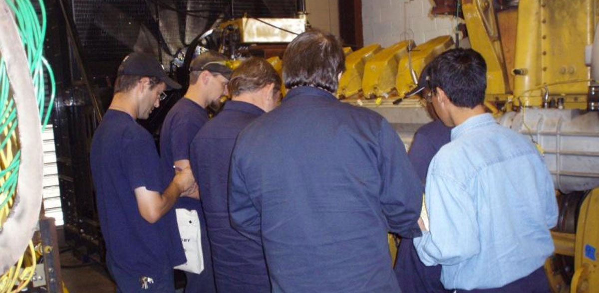 Employees participating in a workplace safety course
